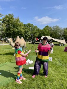 A mother and daughter playing at Elderflower Fields Crazy Golf