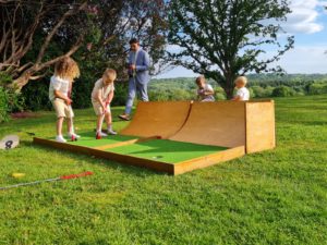 Children playing mini golf