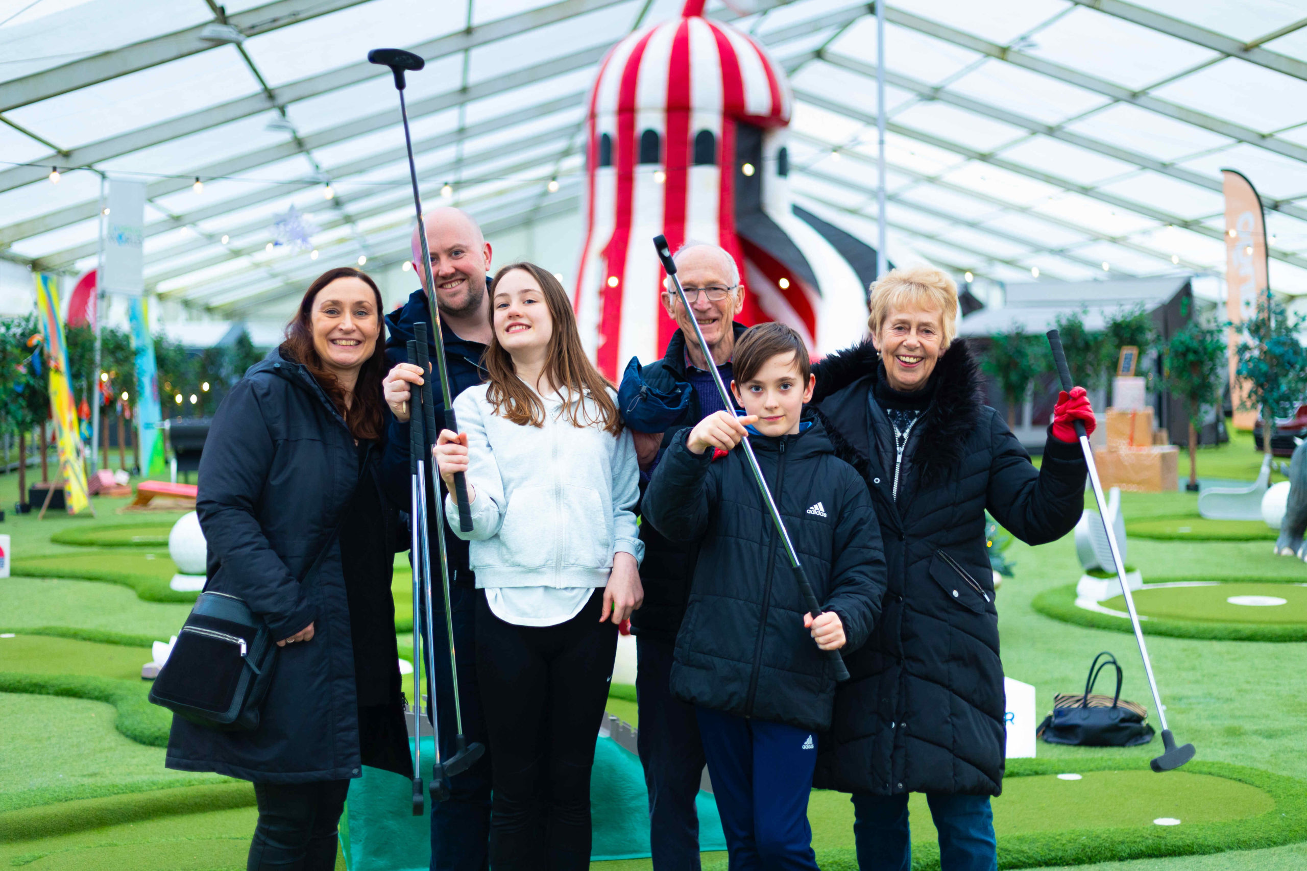 Family booking at an indoor mini golf venue in Horsham