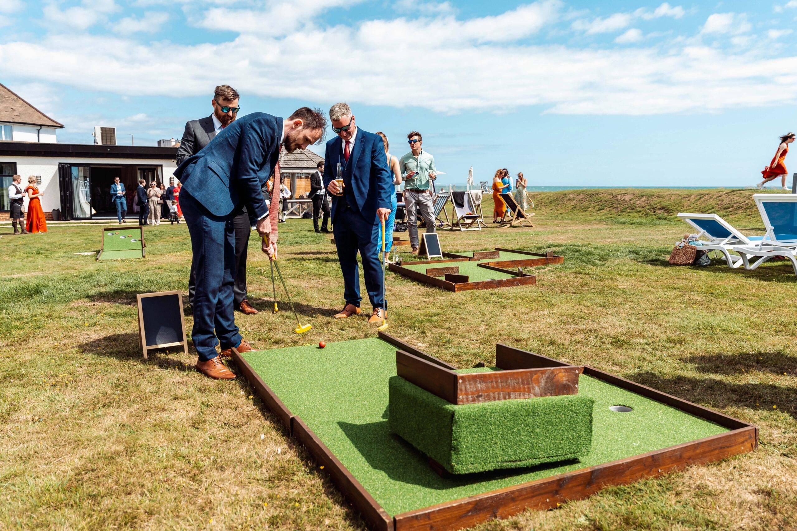 Mini golf at outdoor wedding on seafront